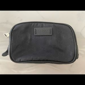 GUCCI
Black GG Nylon Cosmetic Pouch